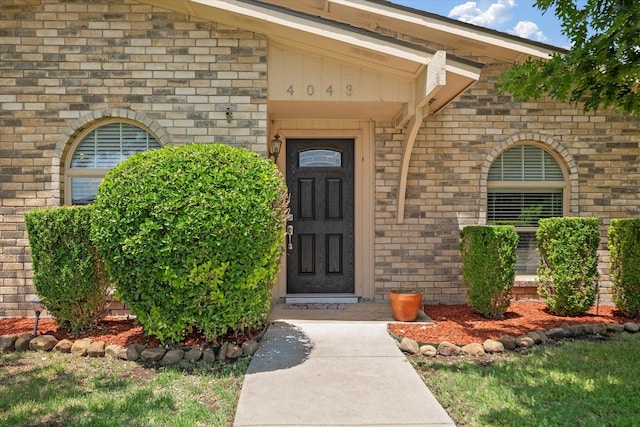 4043 Star Trek Ln, Garland, TX 75044 - property entrance with brick siding