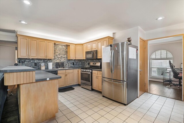 4043 Star Trek Ln, Garland, TX 75044 - kitchen with appliances with stainless steel finishes, light brown cabinets, a peninsula, light tile patterned flooring, and recessed lighting