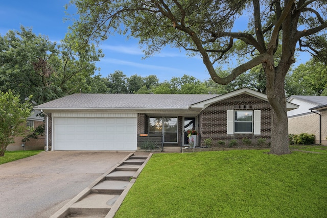 11335 Fernald Ave, Dallas, TX 75218 - ranch-style home featuring brick siding, driveway, an attached garage, and a front yard