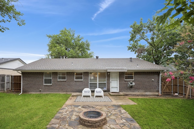 11335 Fernald Ave, Dallas, TX 75218 - rear view of property featuring a fire pit, brick siding, a patio, and roof with shingles