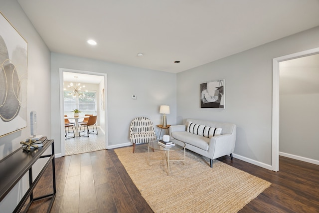 11335 Fernald Ave, Dallas, TX 75218 - living area with dark wood finished floors, a chandelier, and recessed lighting