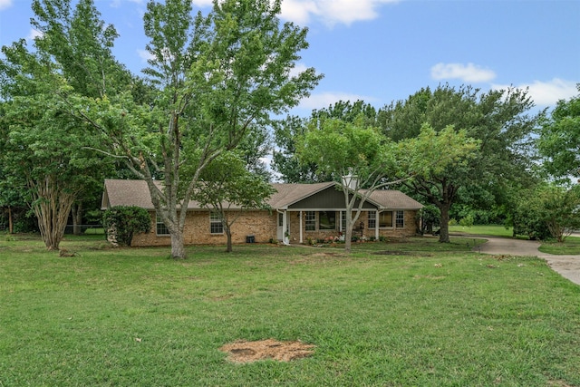 102 Collin Ct, Prosper, TX 75078 - ranch-style house with a front lawn, concrete driveway, and brick siding