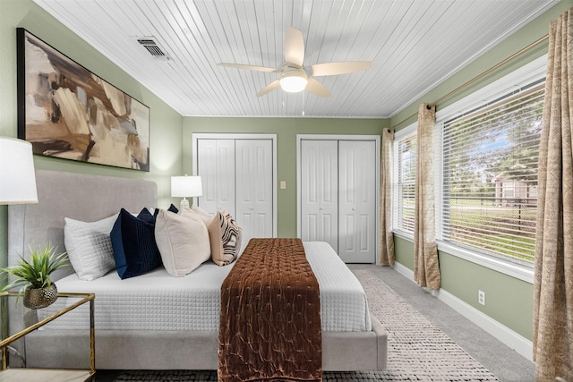 102 Collin Ct, Prosper, TX 75078 - bedroom featuring multiple closets, multiple windows, wooden ceiling, and ceiling fan