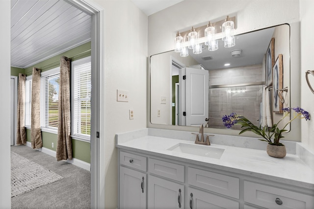 102 Collin Ct, Prosper, TX 75078 - full bath featuring vanity, a tile shower, and a chandelier