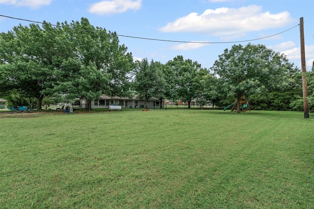 102 Collin Ct, Prosper, TX 75078 - view of green lawn featuring a playground