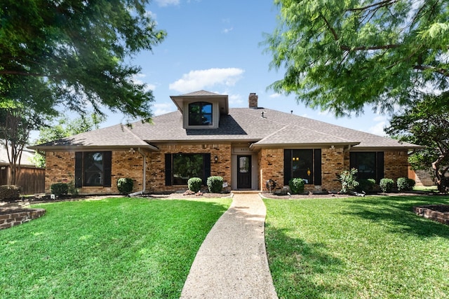 4410 Briargrove Ln, Dallas, TX 75287 - view of front of home with brick siding, a chimney, and a shingled roof