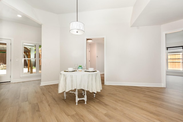 4410 Briargrove Ln, Dallas, TX 75287 - dining room featuring light wood-style flooring