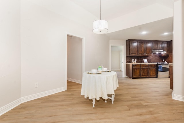 4410 Briargrove Ln, Dallas, TX 75287 - dining area featuring light wood finished floors and recessed lighting