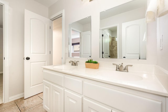 4410 Briargrove Ln, Dallas, TX 75287 - full bathroom featuring double vanity and tile patterned floors