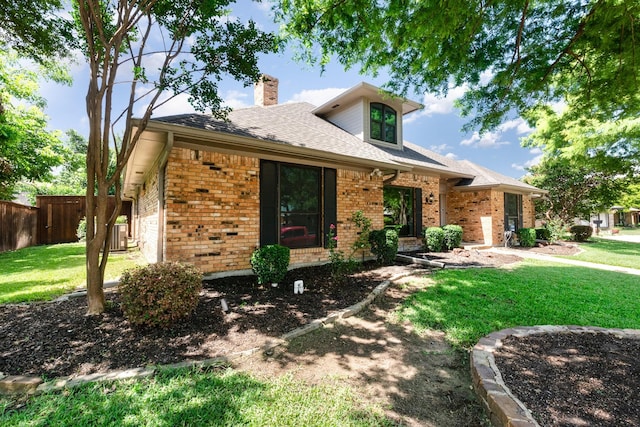 4410 Briargrove Ln, Dallas, TX 75287 - view of front of property featuring brick siding, a chimney, and roof with shingles