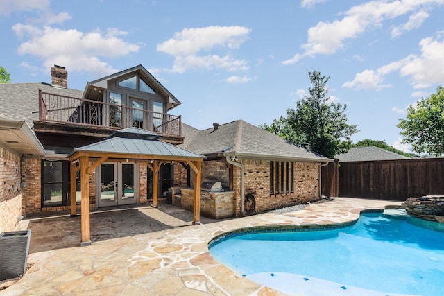4410 Briargrove Ln, Dallas, TX 75287 - view of swimming pool with exterior kitchen, a gazebo, french doors, and a patio area