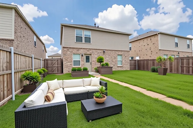 2058 Henrietta Dr, Forney, TX 75126 - rear view of house with an outdoor living space, brick siding, and a fenced backyard