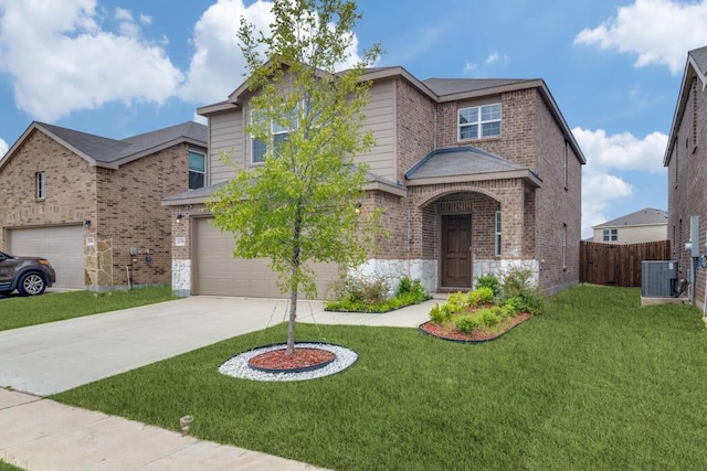 2058 Henrietta Dr, Forney, TX 75126 - traditional-style house featuring concrete driveway, brick siding, a garage, and stone siding
