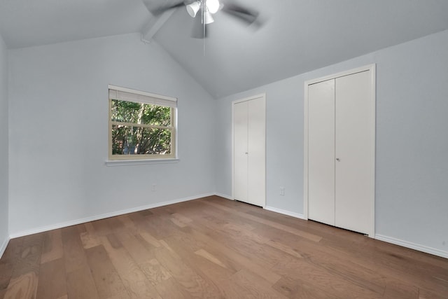 1024 E Peters Colony Rd, Carrollton, TX 75007 - unfurnished bedroom featuring multiple closets, wood finished floors, and ceiling fan