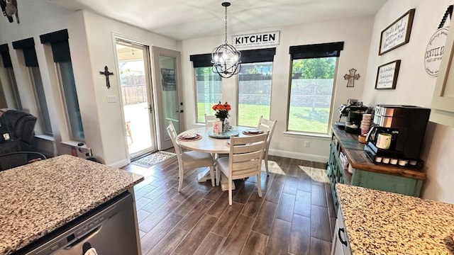 1518 Primrose Pl, Haslet, TX 76052 - dining area with a chandelier and dark wood finished floors