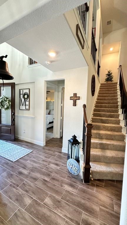 1518 Primrose Pl, Haslet, TX 76052 - stairway featuring baseboards and wood finish floors