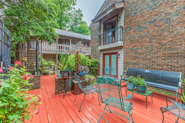 4239 Mckinney Ave Unit 202, Dallas, TX 75205 - wooden deck featuring outdoor lounge area and french doors