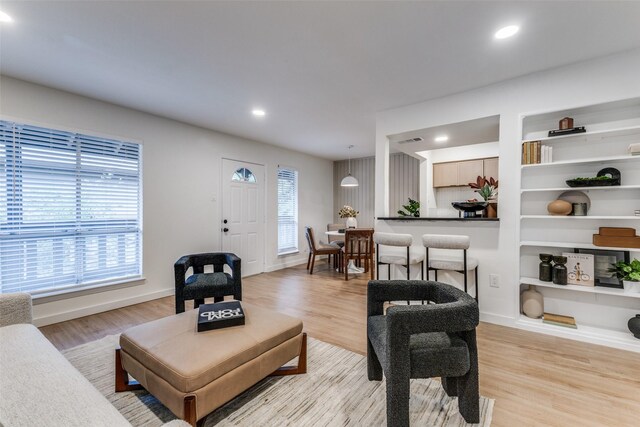4239 Mckinney Ave Unit 202, Dallas, TX 75205 - bedroom featuring access to outside, wood finished floors, and a ceiling fan