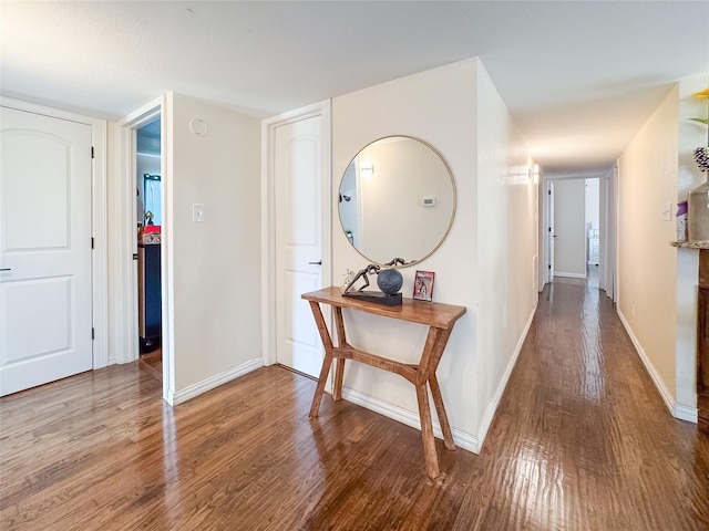 503 White Oak St, Allen, TX 75002 - hallway featuring wood finished floors and baseboards