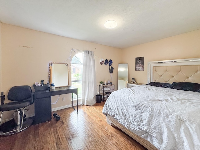 503 White Oak St, Allen, TX 75002 - bedroom featuring wood finished floors and a desk