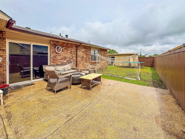 503 White Oak St, Allen, TX 75002 - fenced backyard featuring a patio and an outdoor living space with a fire pit