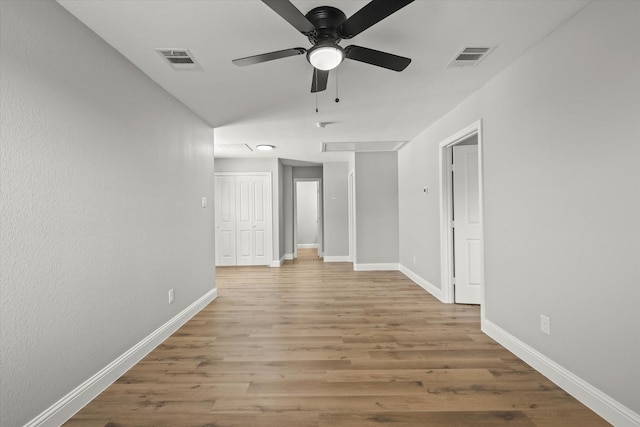 6311 Pebble Ave, Dallas, TX 75217 - spare room featuring ceiling fan and wood finished floors