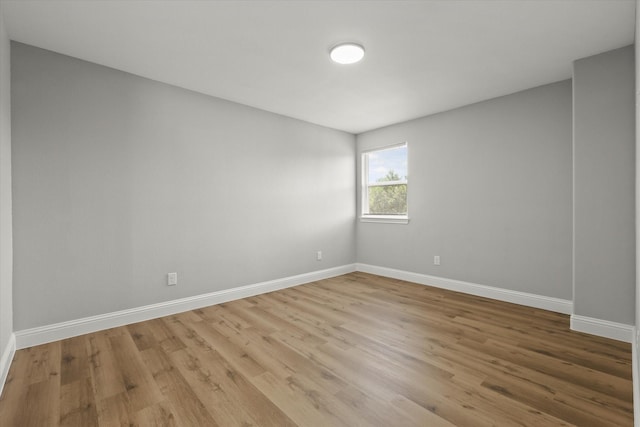 6311 Pebble Ave, Dallas, TX 75217 - empty room featuring wood finished floors and baseboards