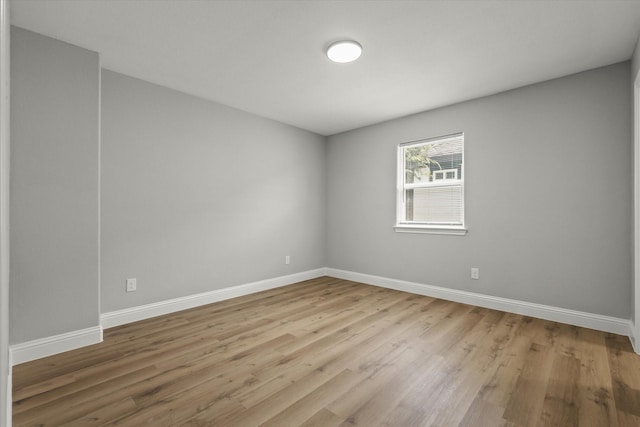 6311 Pebble Ave, Dallas, TX 75217 - unfurnished room featuring baseboards and wood finished floors