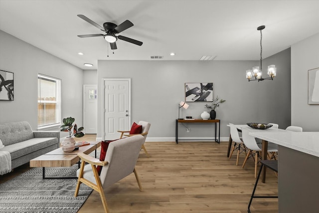 6311 Pebble Ave, Dallas, TX 75217 - living area featuring light wood-type flooring, a chandelier, recessed lighting, and a ceiling fan