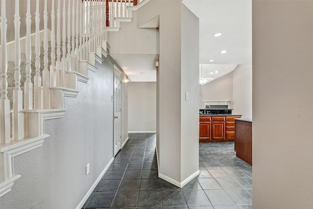 3212 Cantura Dr, Mesquite, TX 75181 - hall with dark tile patterned floors, stairs, recessed lighting, and a high ceiling