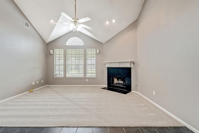 3212 Cantura Dr, Mesquite, TX 75181 - unfurnished living room with carpet floors, ceiling fan, vaulted ceiling, a fireplace, and tile patterned floors