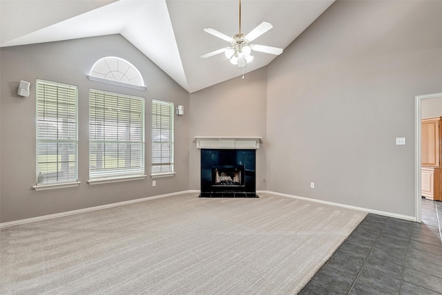 3212 Cantura Dr, Mesquite, TX 75181 - unfurnished living room featuring healthy amount of natural light, high vaulted ceiling, a ceiling fan, dark colored carpet, and a fireplace