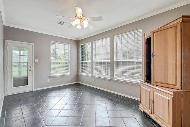 3212 Cantura Dr, Mesquite, TX 75181 - unfurnished dining area with a ceiling fan, ornamental molding, and tile patterned floors