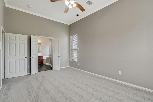 3212 Cantura Dr, Mesquite, TX 75181 - unfurnished bedroom featuring carpet floors, crown molding, a high ceiling, connected bathroom, and a ceiling fan