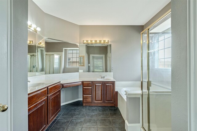 3212 Cantura Dr, Mesquite, TX 75181 - full bathroom featuring a shower stall, double vanity, a bath, and tile patterned floors