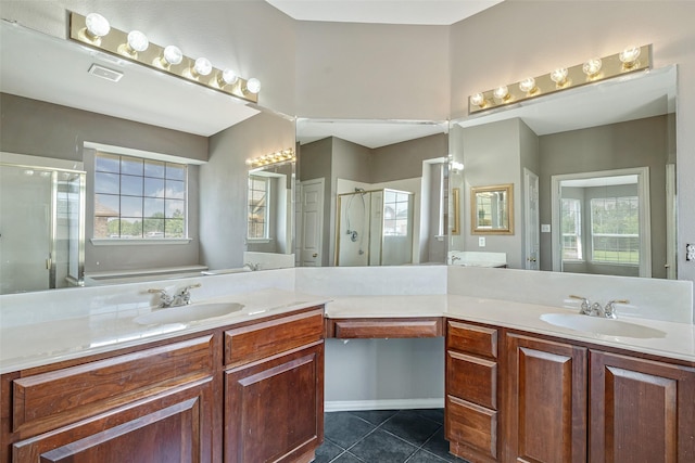 3212 Cantura Dr, Mesquite, TX 75181 - bathroom with tile patterned floors, a stall shower, and vanity