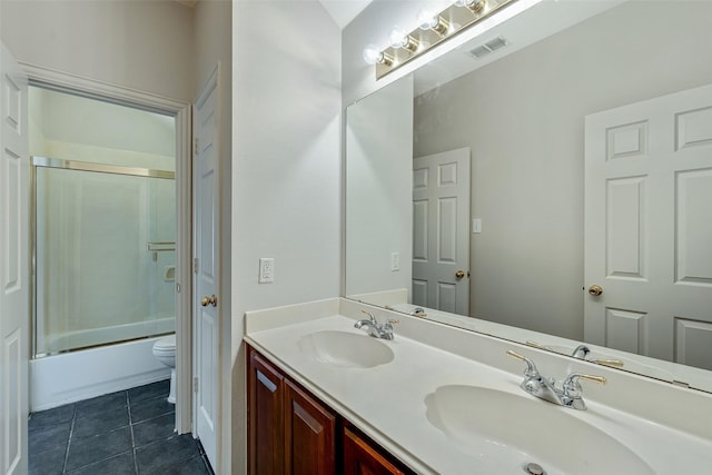 3212 Cantura Dr, Mesquite, TX 75181 - bathroom featuring double vanity, tile patterned flooring, and shower / bath combination with glass door