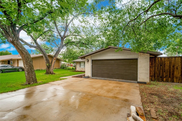 2305 Briarwood Ln, Carrollton, TX 75006 - garage featuring concrete driveway