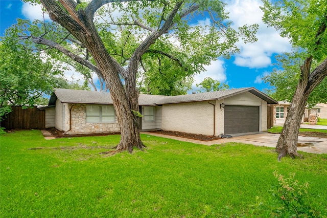 2305 Briarwood Ln, Carrollton, TX 75006 - view of front facade featuring an attached garage, concrete driveway, and brick siding