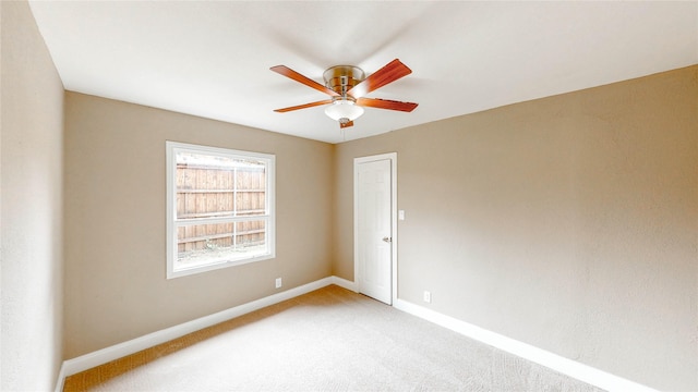 2305 Briarwood Ln, Carrollton, TX 75006 - empty room featuring ceiling fan and light carpet