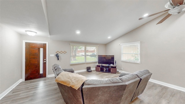 2305 Briarwood Ln, Carrollton, TX 75006 - living area with light wood finished floors, ceiling fan, recessed lighting, and vaulted ceiling
