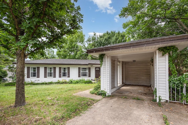 567 Peavy Rd, Dallas, TX 75218 - ranch-style home with concrete driveway, a front yard, and an attached carport