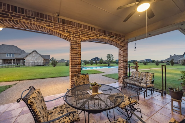 1535 Winding Creek Ln, Rockwall, TX 75032 - view of patio / terrace with ceiling fan and an outdoor pool