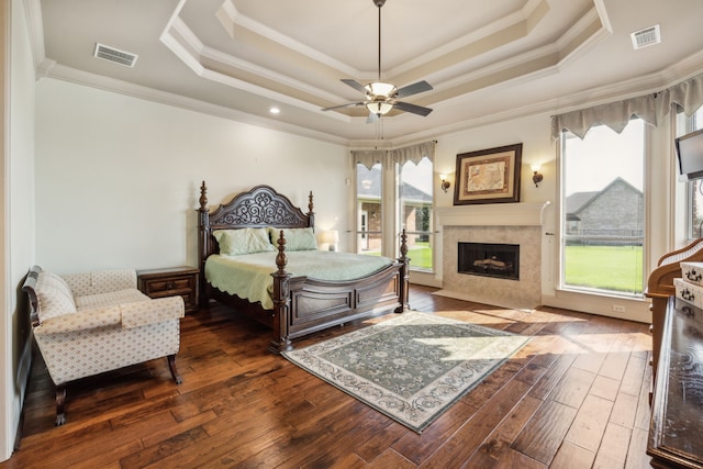 1535 Winding Creek Ln, Rockwall, TX 75032 - living area featuring a ceiling fan, ornamental molding, dark wood-type flooring, and a fireplace