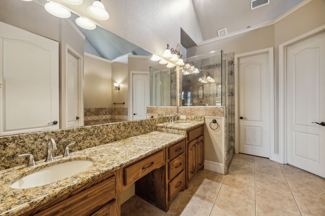 1535 Winding Creek Ln, Rockwall, TX 75032 - bathroom with lofted ceiling, a stall shower, double vanity, tile patterned flooring, and a chandelier