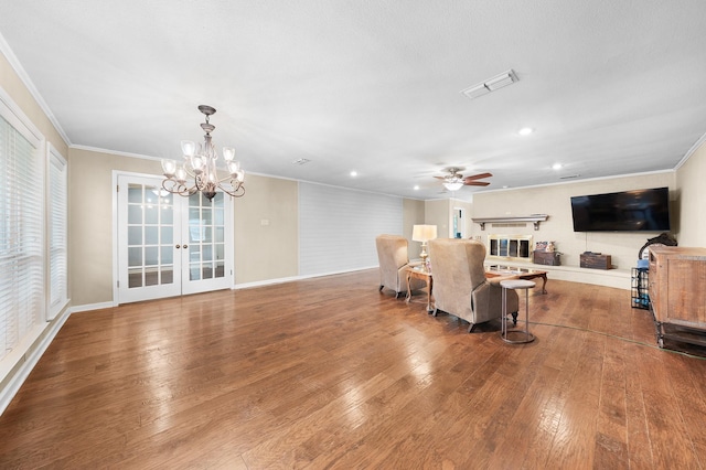 1440 Live Oak St, Sulphur Springs, TX 75482 - living area with ornamental molding, wood-type flooring, ceiling fan, recessed lighting, and a chandelier