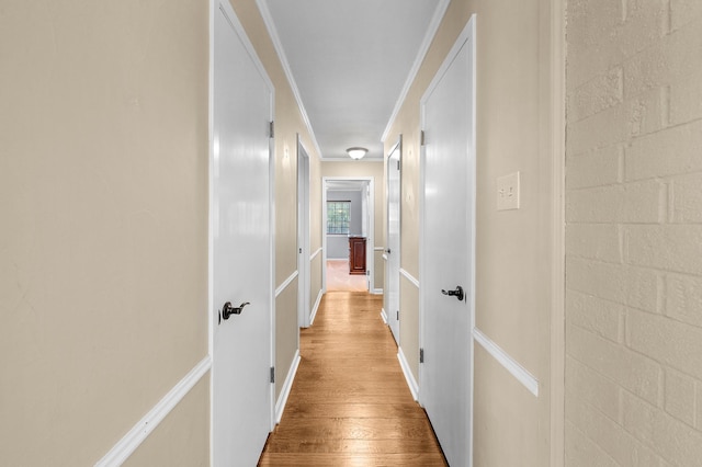 1440 Live Oak St, Sulphur Springs, TX 75482 - hallway with wood finished floors and ornamental molding
