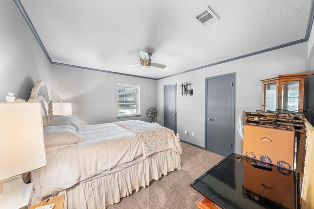 1440 Live Oak St, Sulphur Springs, TX 75482 - carpeted bedroom with crown molding and ceiling fan