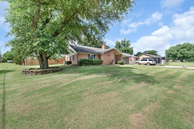 1440 Live Oak St, Sulphur Springs, TX 75482 - view of front of home featuring a chimney and brick siding