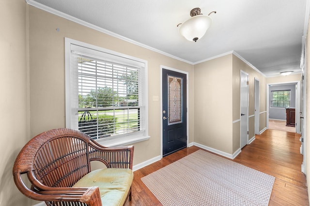 1440 Live Oak St, Sulphur Springs, TX 75482 - entrance foyer featuring wood finished floors and crown molding
